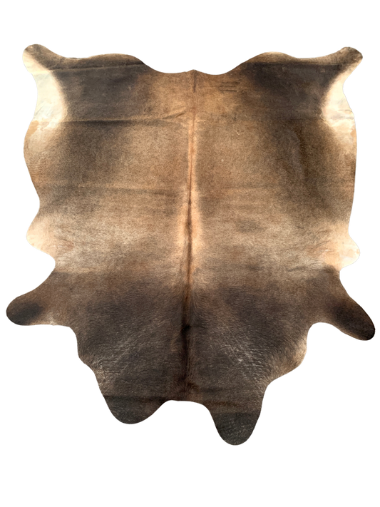 Geniune cowhide rug with beautiful pattern, with natural imperfections due to unique nature of geniune cowhides.