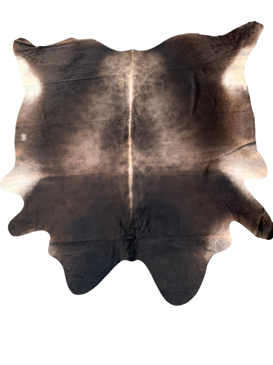Geniune cowhide rug with beautiful pattern, with natural imperfections due to unique nature of geniune cowhides.