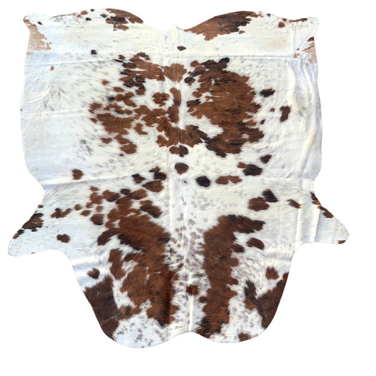 Geniune cowhide rug with beautiful pattern, with natural imperfections due to unique nature of geniune cowhides.