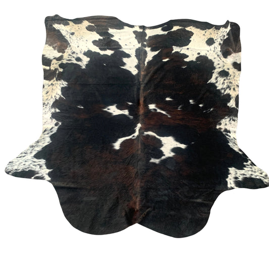Geniune cowhide rug with beautiful pattern, with natural imperfections due to unique nature of geniune cowhides.