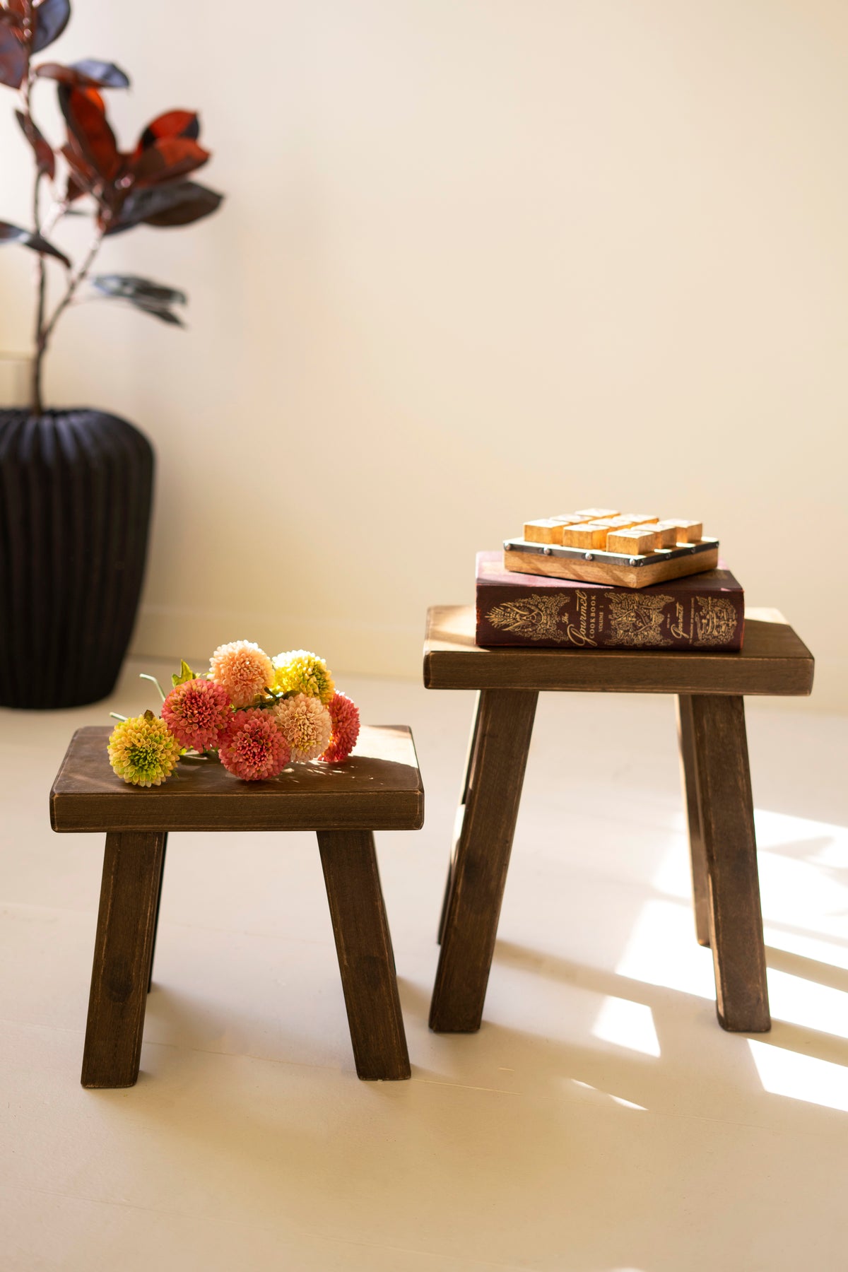 Dark Brown Rectangle Wood Stools - Set of 2 with books and flowers, suitable for various decorative uses.