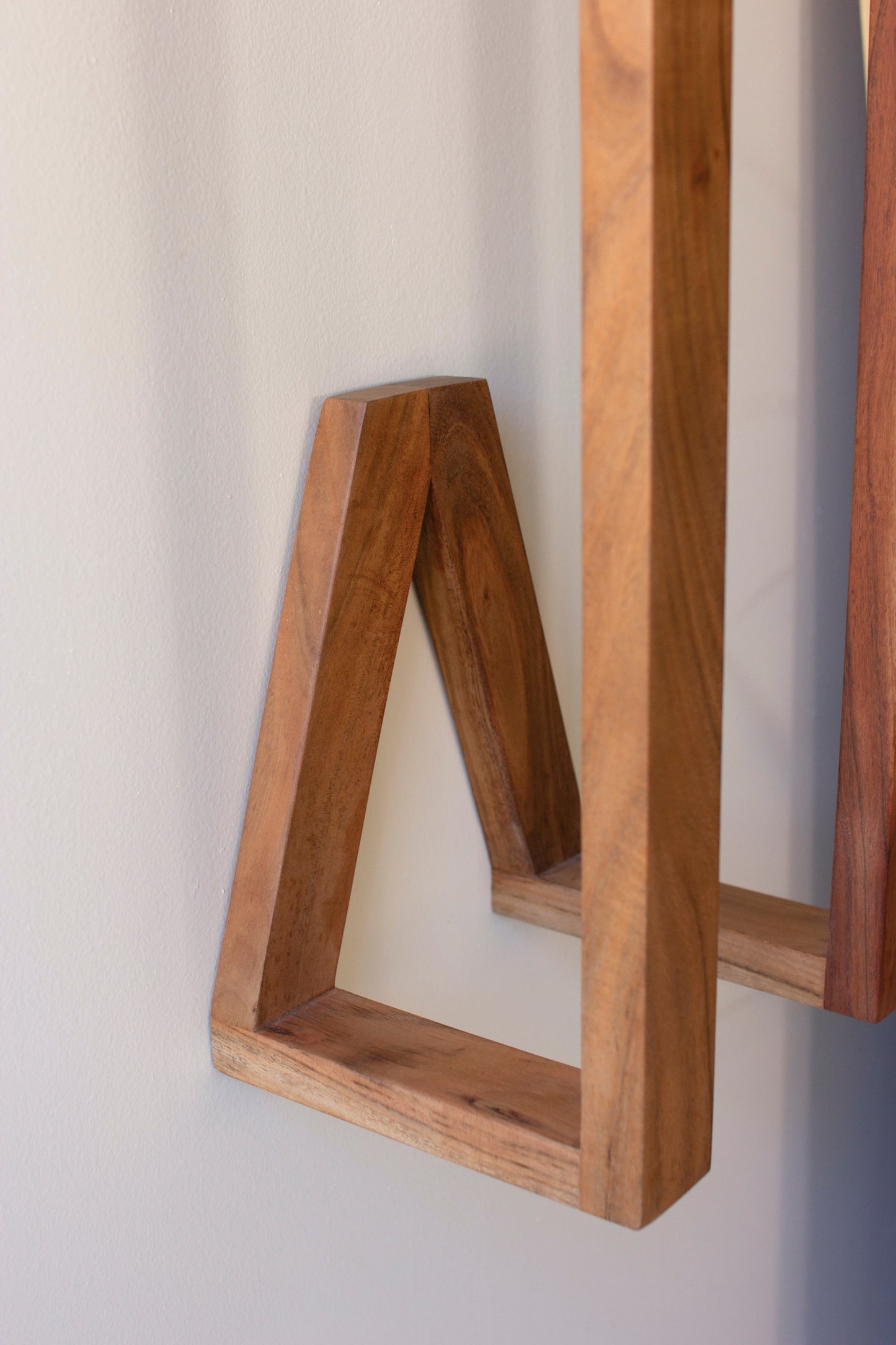 Wooden Wall Towel Rack close-up showing sleek design and natural wood finish on a wall.
