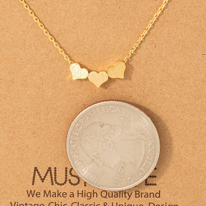 Three Dainty Hearts Necklace: Silver