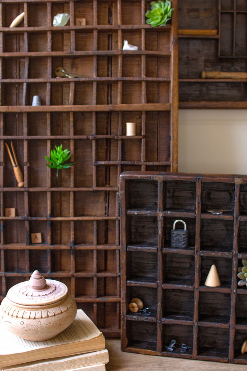 Wooden printer tray with decorative items in a room setting.
