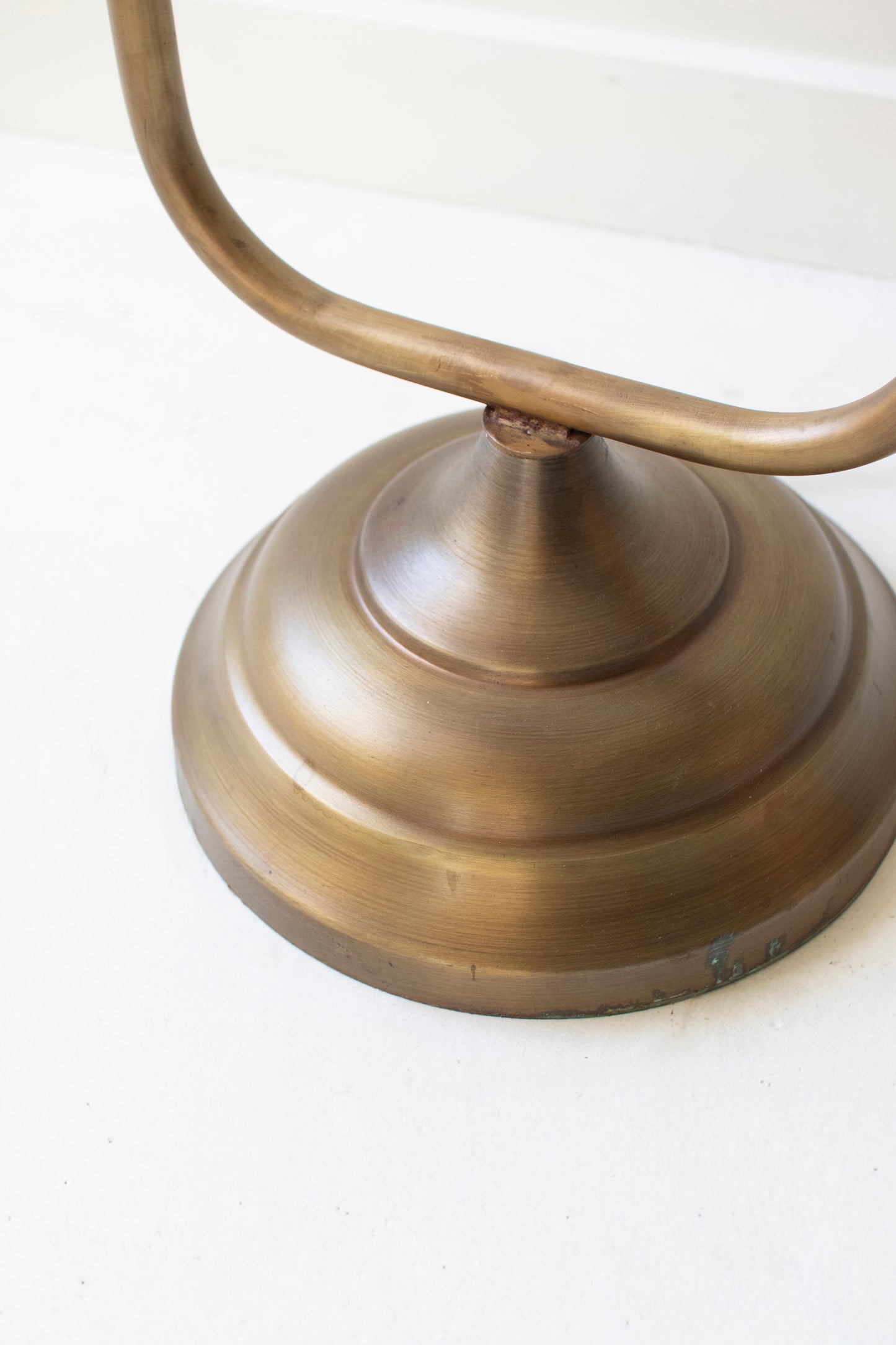 Antique Gold Double Floor Lamp with Metal Shades base detail showing a smooth, rounded design and elegant finish.