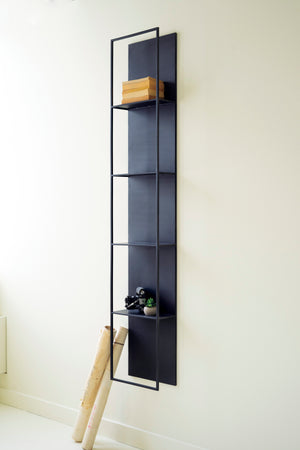 Black Metal Four-Tiered Wall Shelf displaying a wooden box and greenery against a neutral wall, maximizing space.
