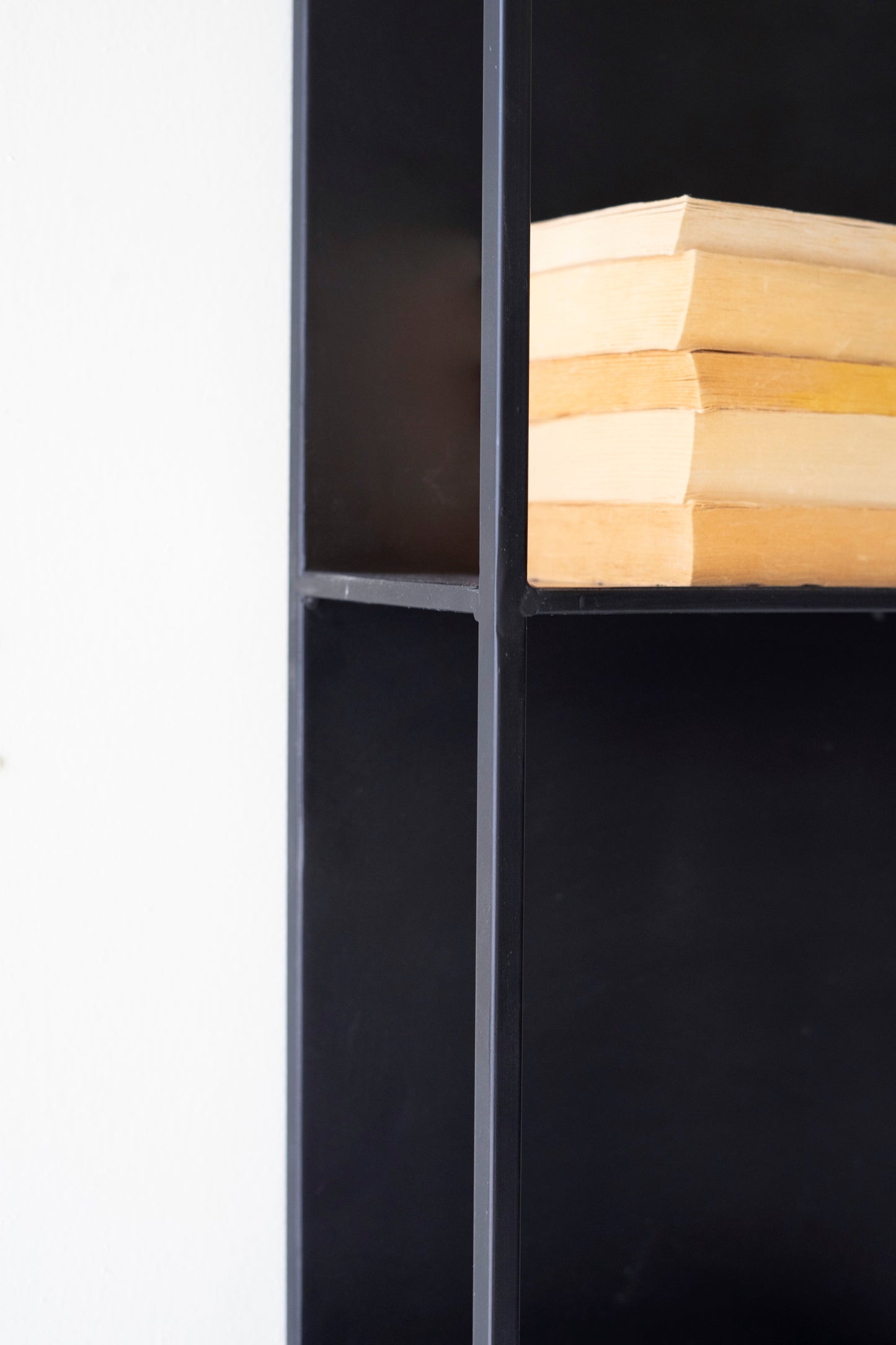 Black Metal Four-Tiered Wall Shelf