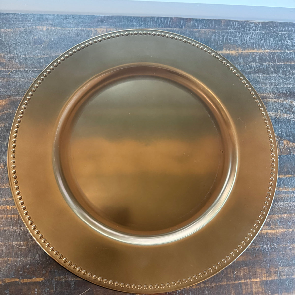 Bronze Plate Charter on tabletop