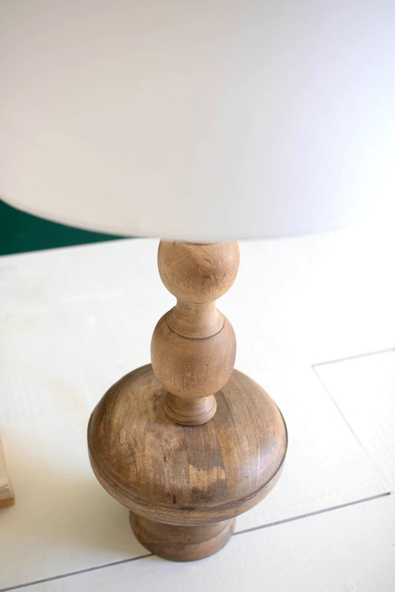 Carved Wooden Table Lamp With Off-White Barrel Shade