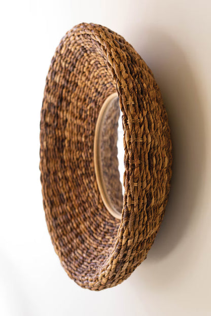 Round Woven Framed Mirror on a white background