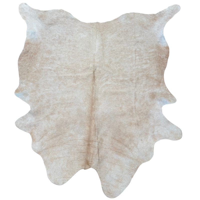 Beige cowhide rug on a white background