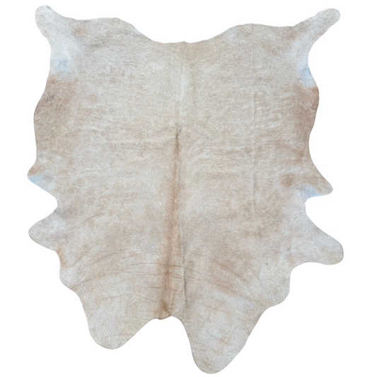 Beige cowhide rug on a white background