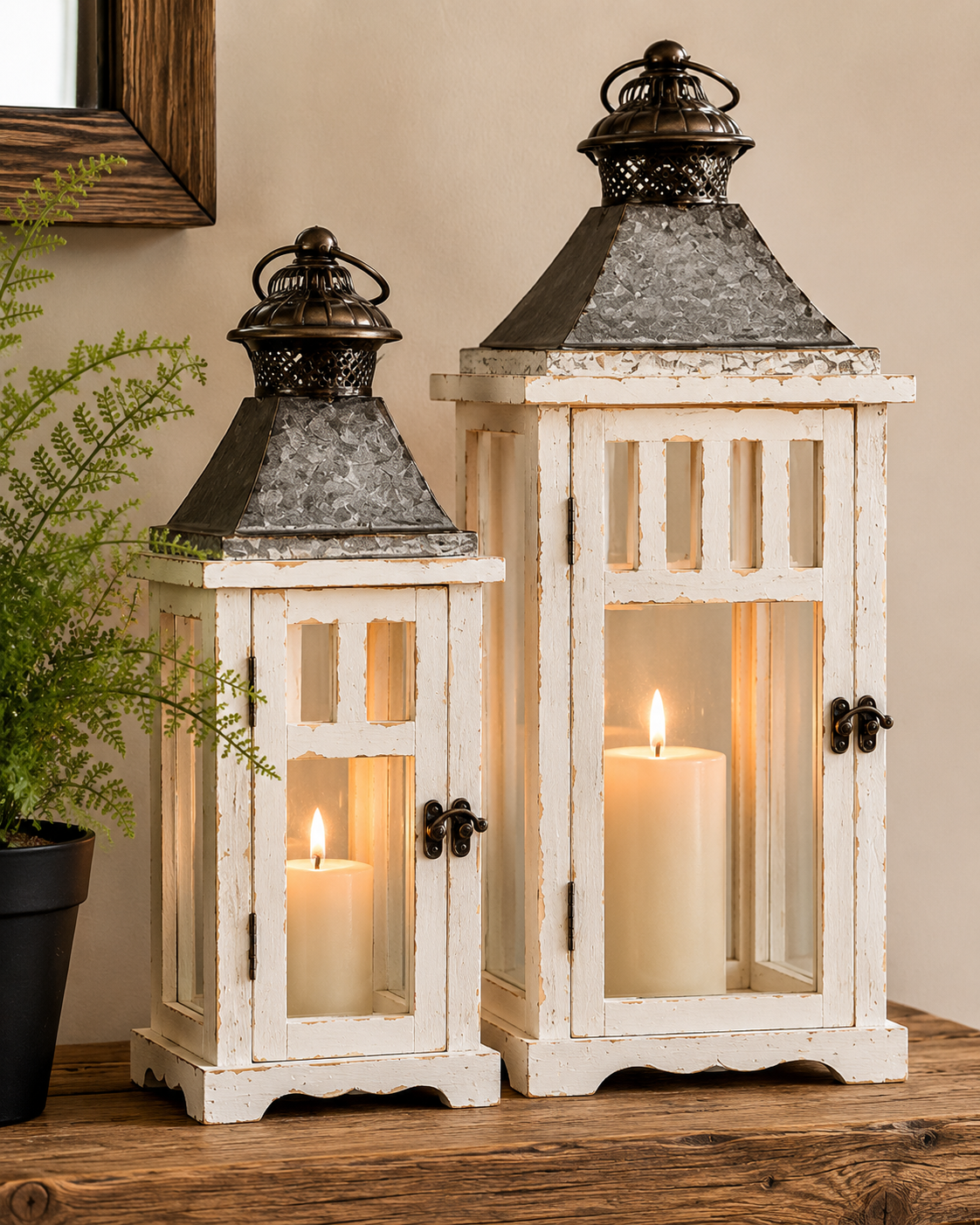 Rustic lanterns - home decor-Two white lanterns with glass panels on a wooden surface, one lit with a candle.
