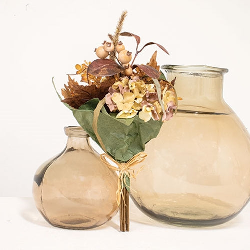 Faux fall floral bouquet wrapped with raffia tie