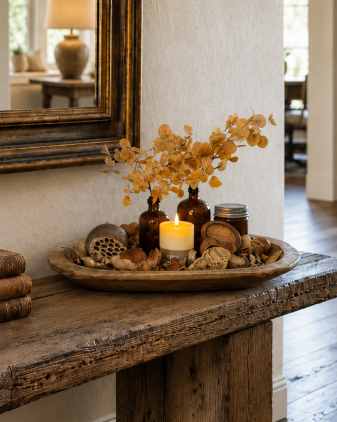 medium rustic wood dough bowl filled with fall decor