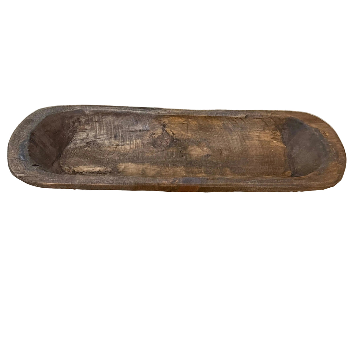 narrow rustic wood bowl on table runner