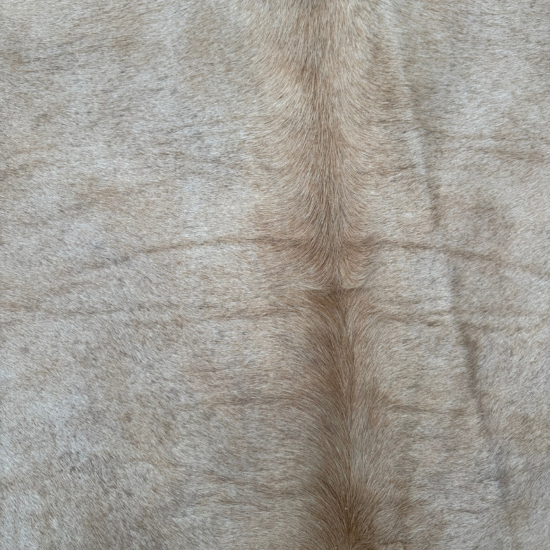 Close-up of a textured brown fabric surface