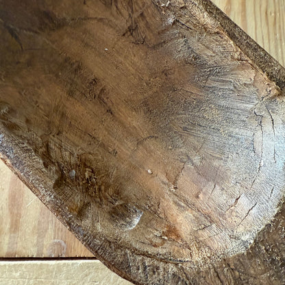 Close-up of a wooden bowl with visible grain and texture