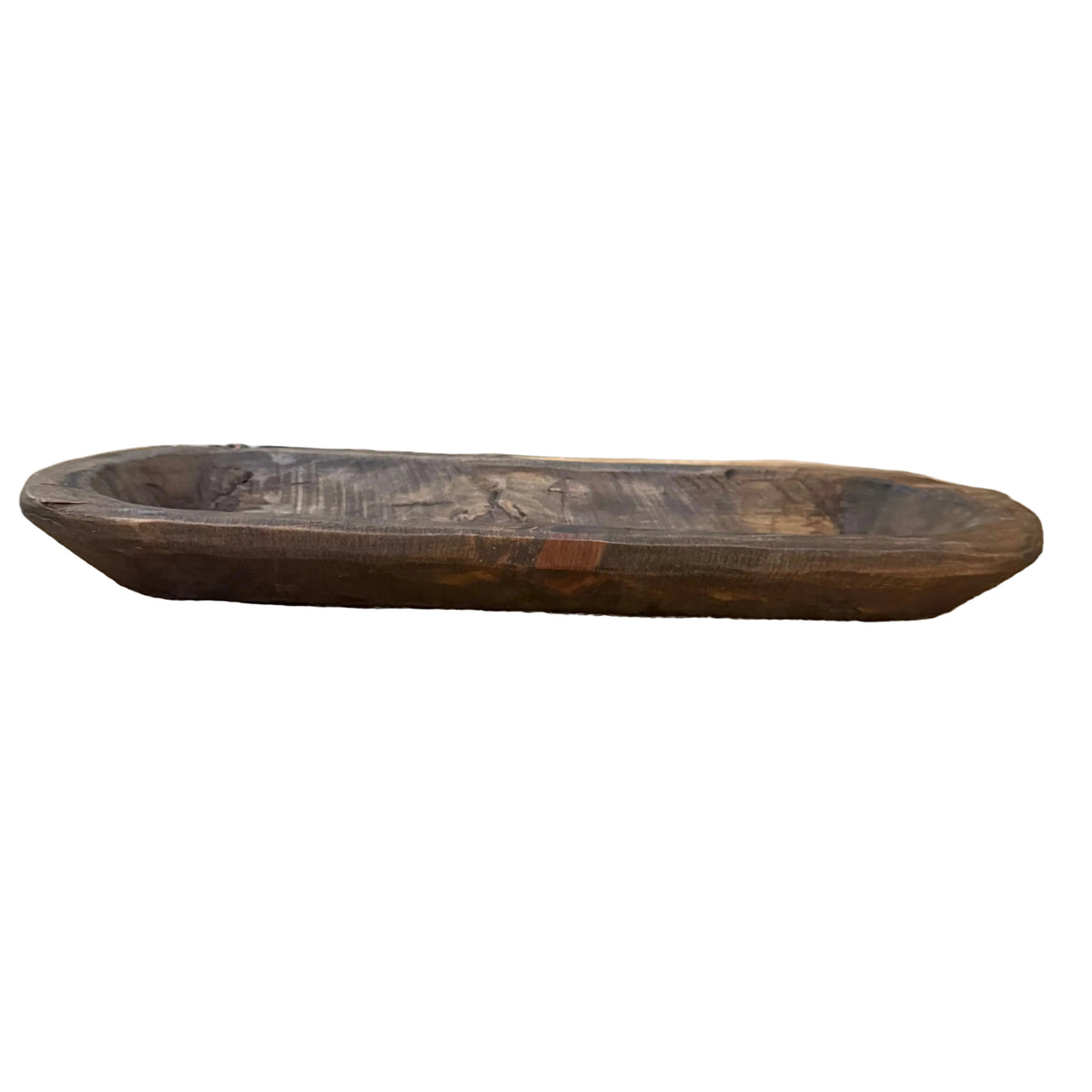 dark wood bowl on table runner
