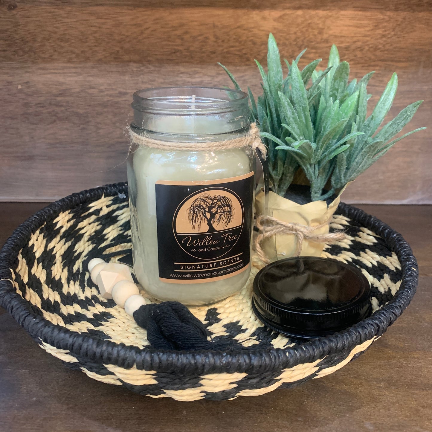 seagrass basket tray with candle and greenery