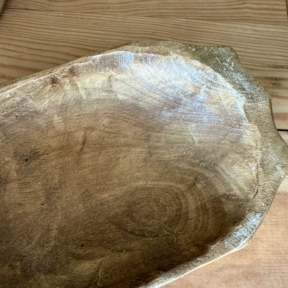 close up of vintage style small dough bowl with irregular outline